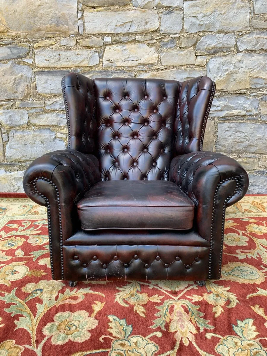 A hide Leather deep button library armchair - Image 1