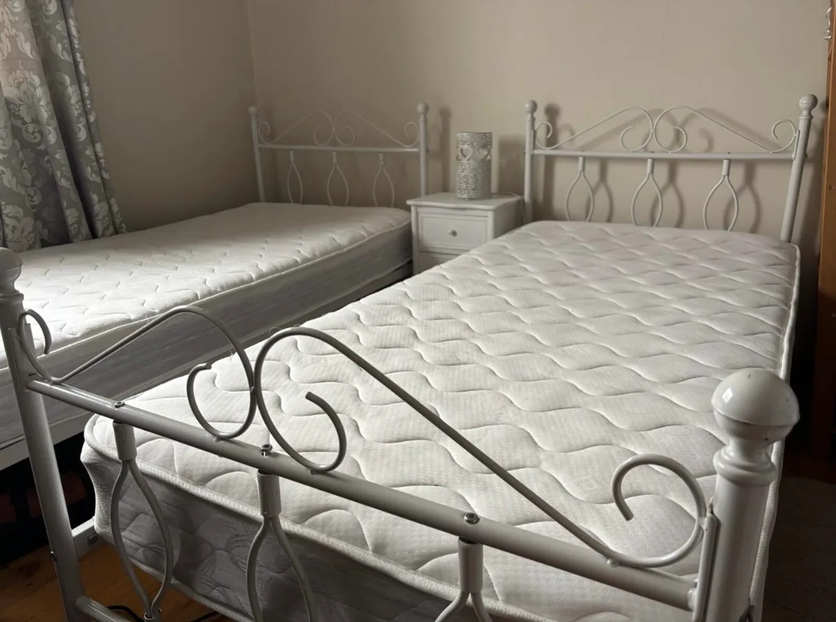 2 single bed frames and 2 single mattresses. - Image 3