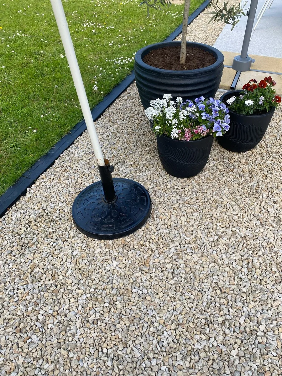 Umbrella and stand and table - Image 1