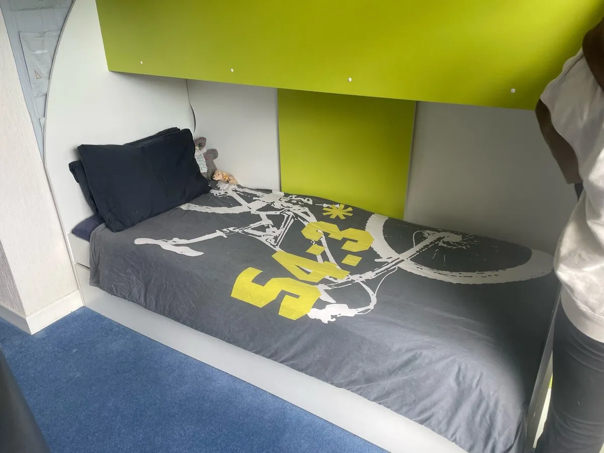 Bunk bed with storage and bookshelves - Image 1