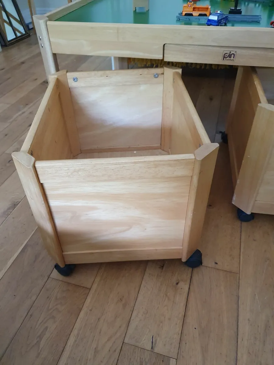 Play table with large storage boxes on wheels. - Image 3