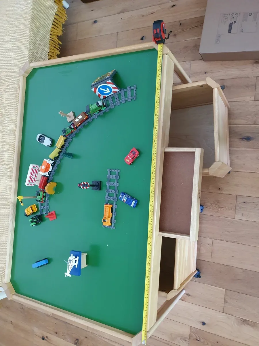 Play table with large storage boxes on wheels. - Image 4