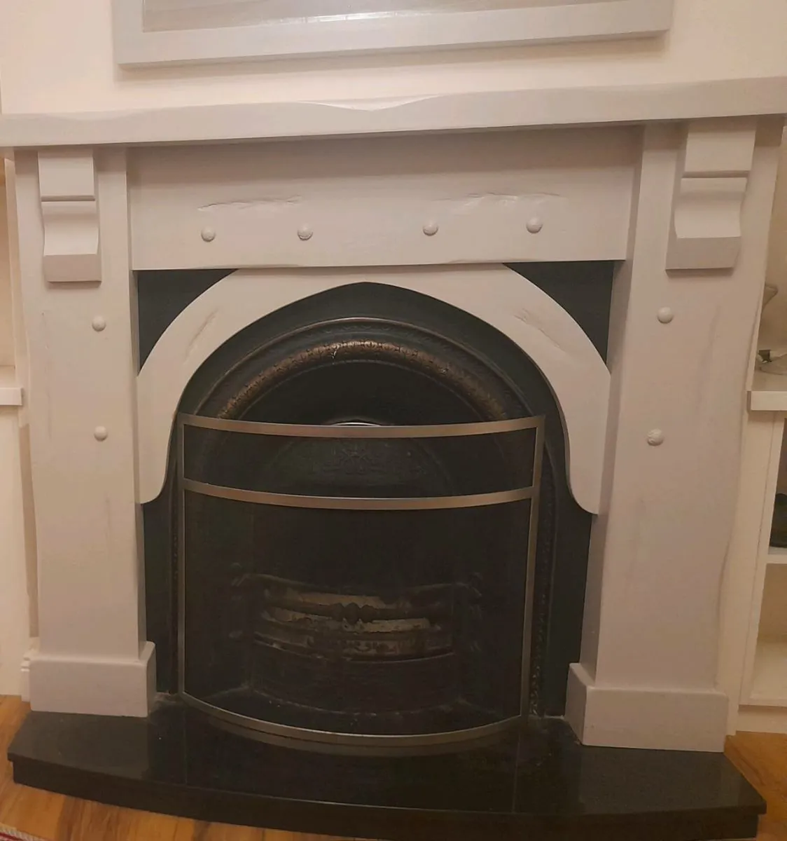 Timber fireplace with insert