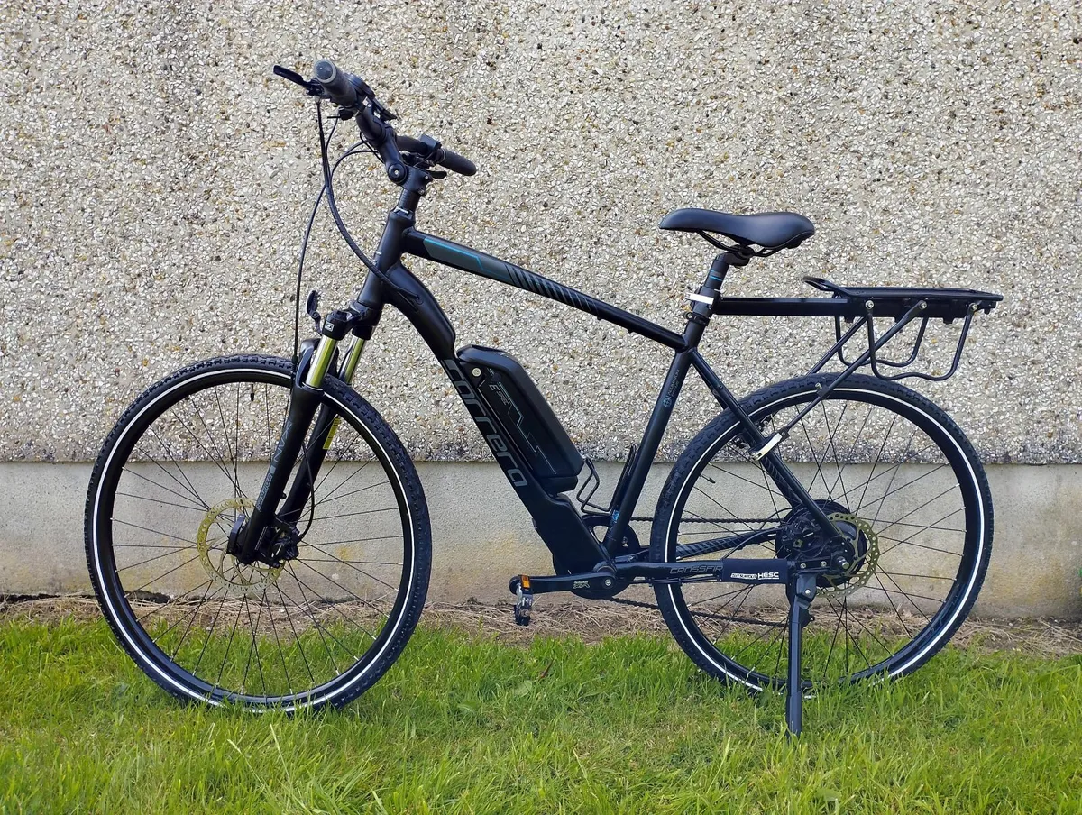 Carrera Crossfire Electric Bike 2.0 + Accessories - Image 1