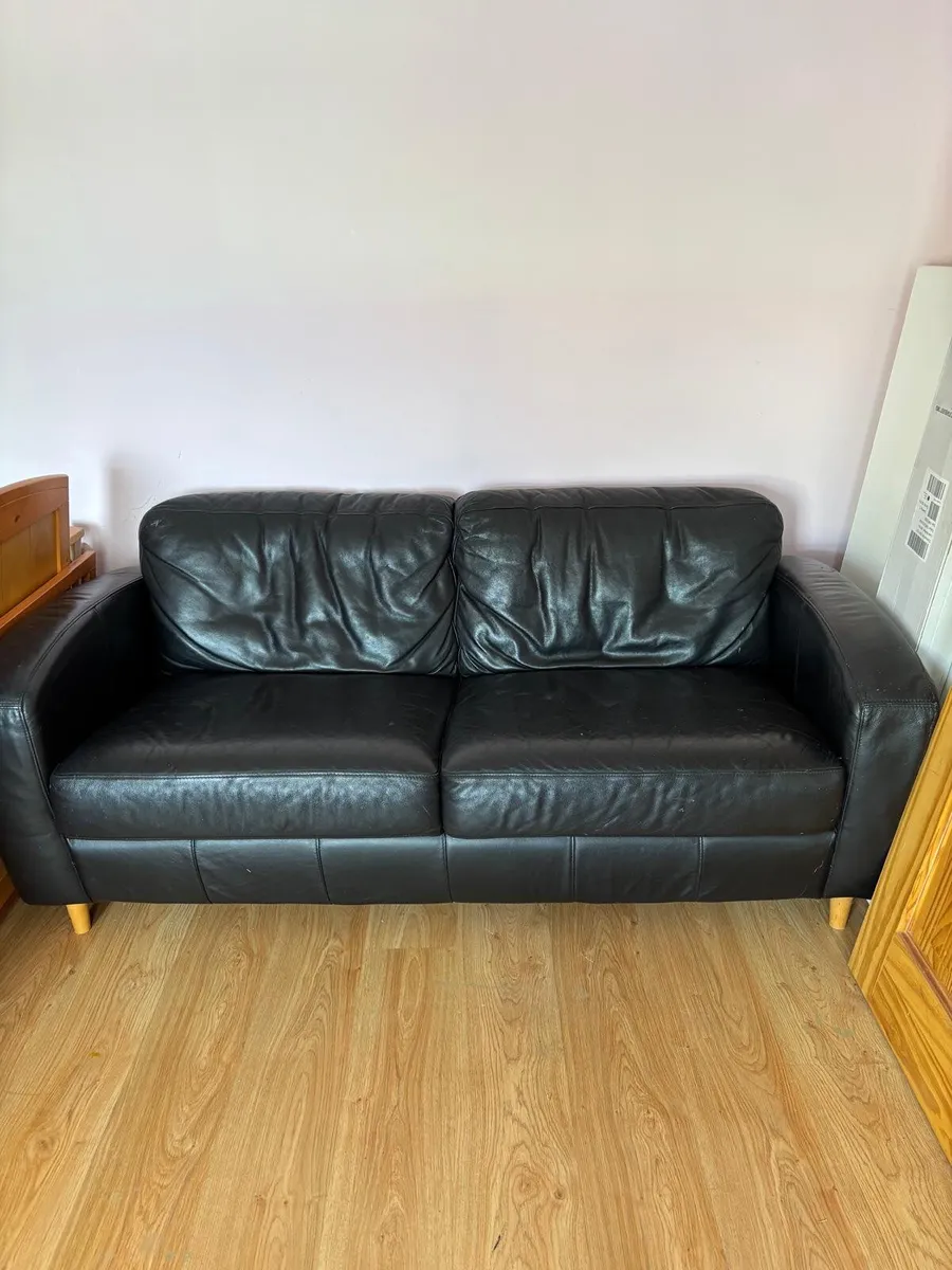 2 seater black leather sofa