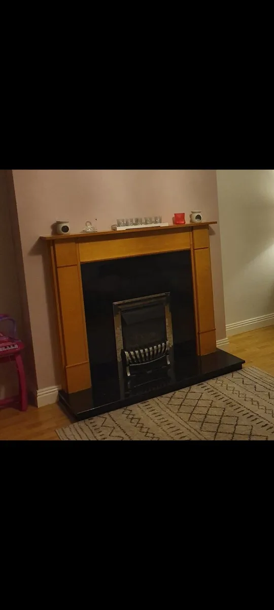 Pine fireplace with marble hearth