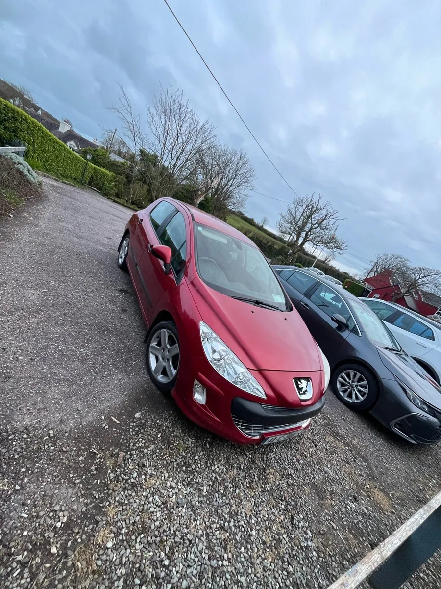 Peugeot 308 Diesel Red 2010 - Image 1