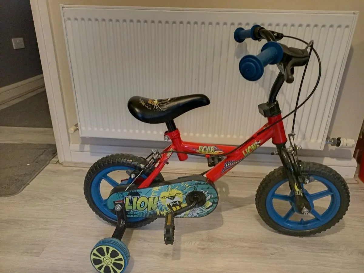 Kids lion bike size 12 inch wheels. - Image 1