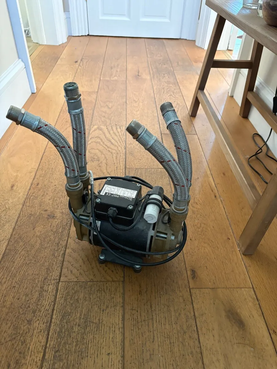 shower pump - Image 1