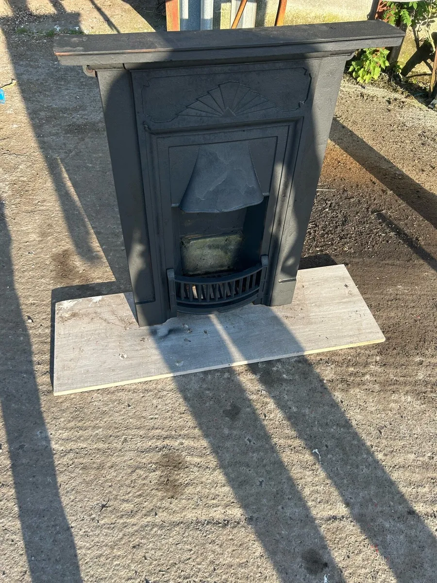 Cast iron fire place and fuel and coal bunker - Image 1