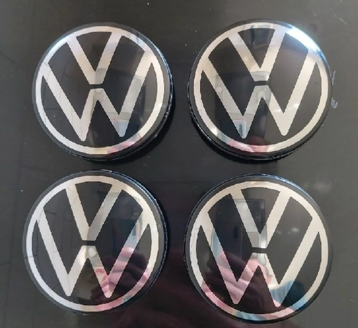 4 x NEW VW 65mm Centre Caps (New Logo) FREE POST - Image 1