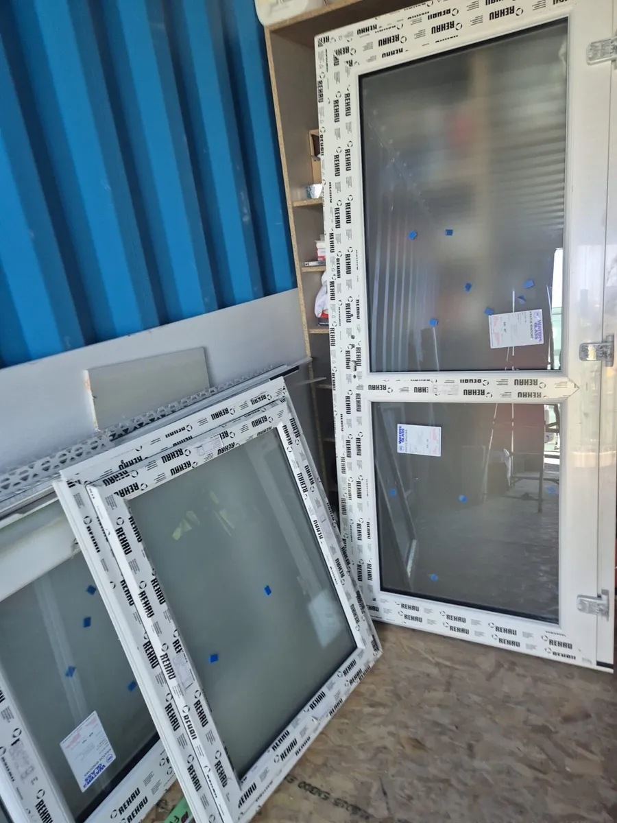 NEW 2 x PVC back doors & 1 Rehau window