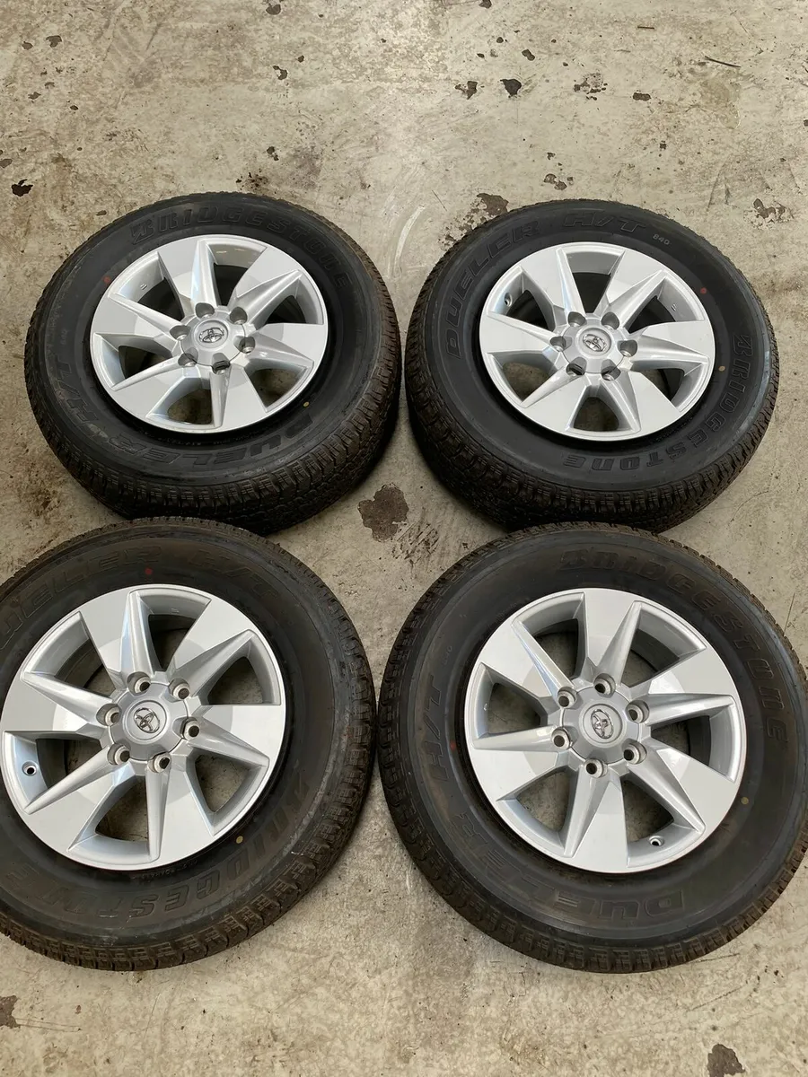 17 inch Landcruiser alloys w/new tyres - Image 1