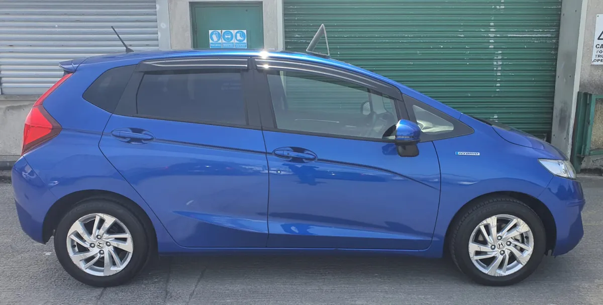 2014 Honda Fit Hybrid | Half Leather - Image 4