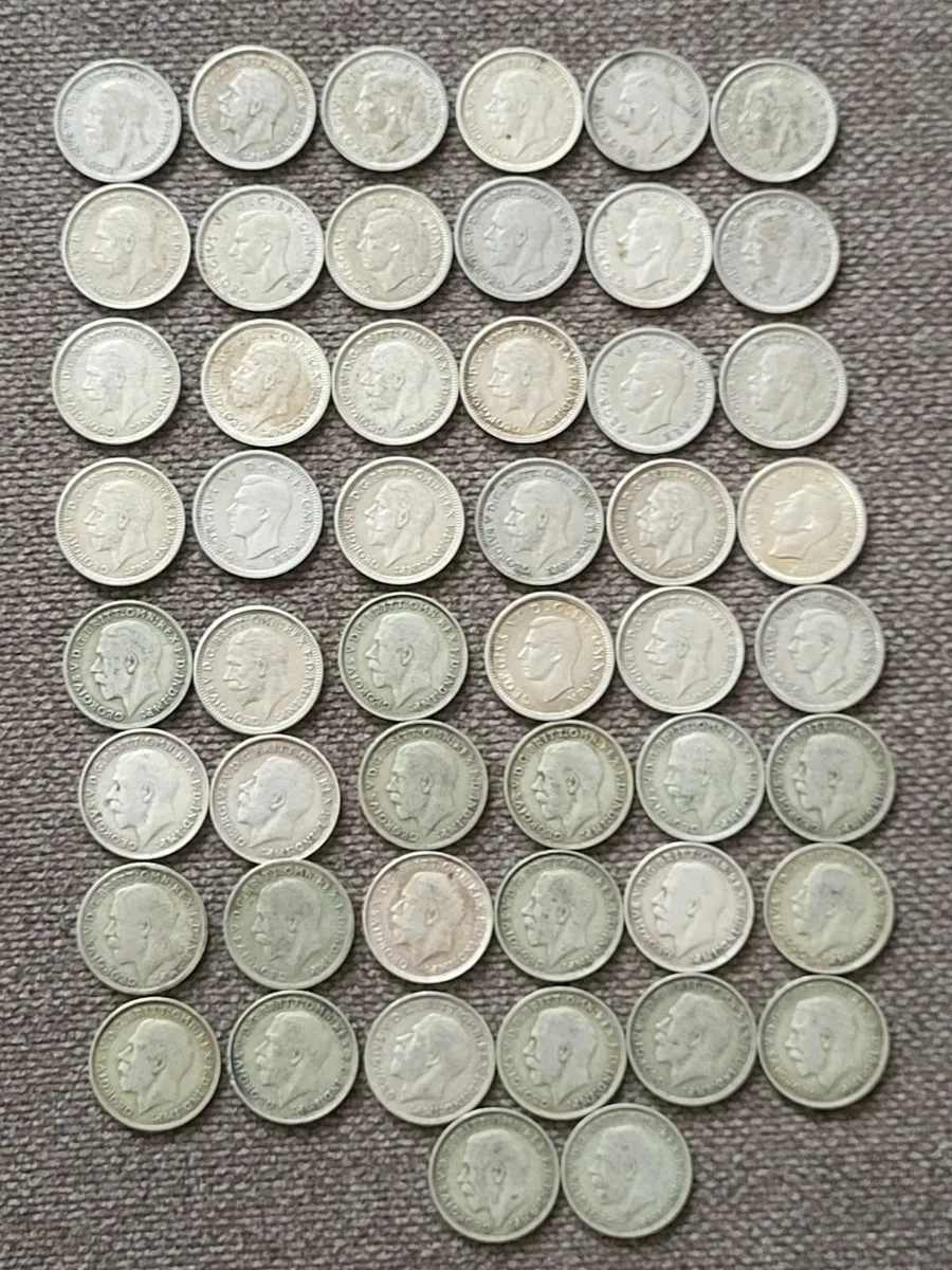 50 British silver three pence coins - Image 1