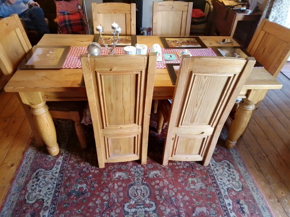 Solid wood table and 8 chairs - Image 1