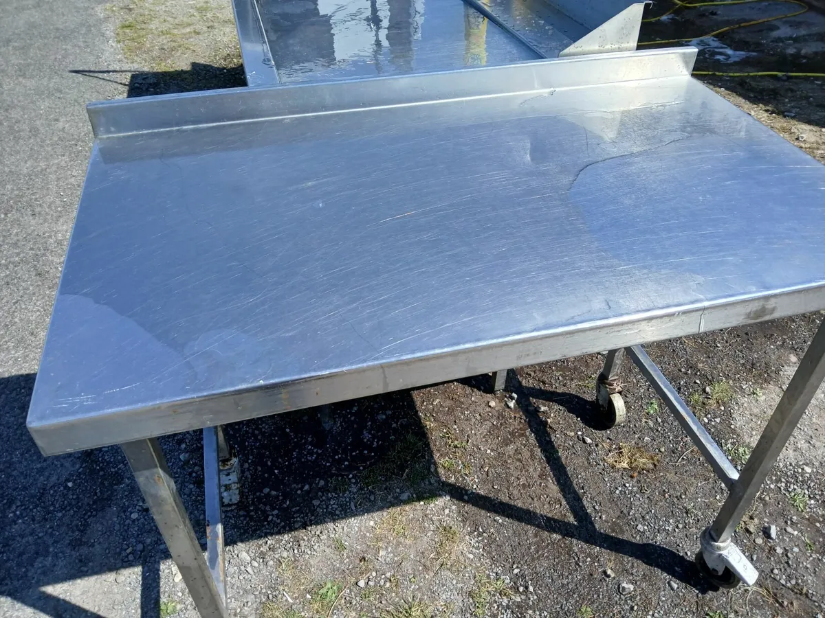 Stainless steel table ...on wheels  delivered - Image 1