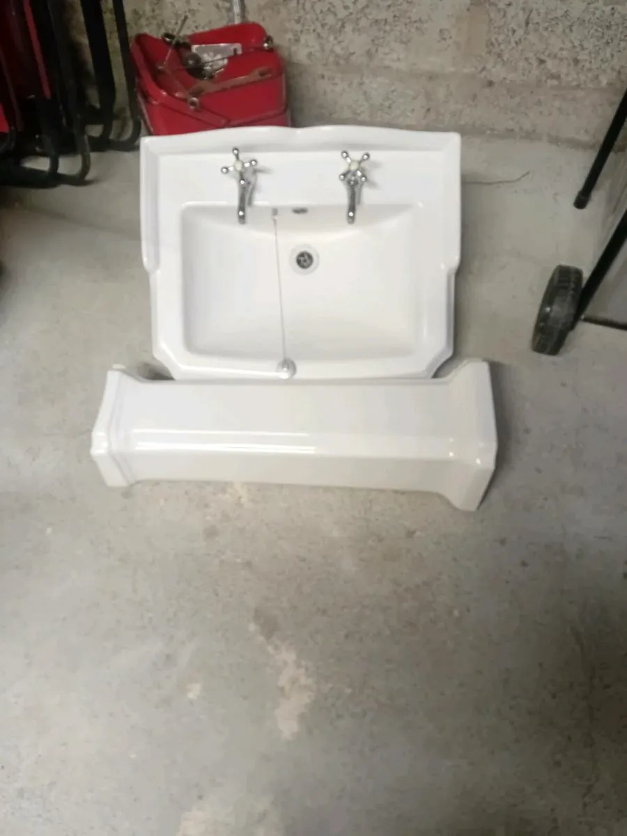 Sink, taps and pedestal