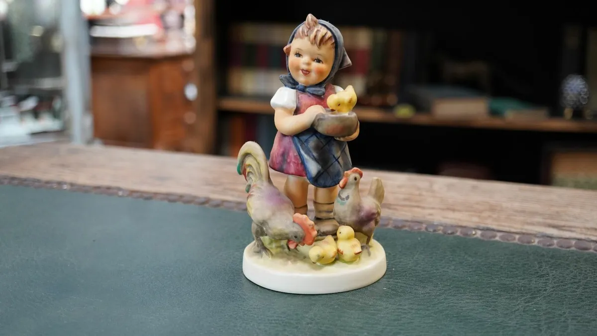 Goebel Hummel Figurine - Feeding Time - Image 1