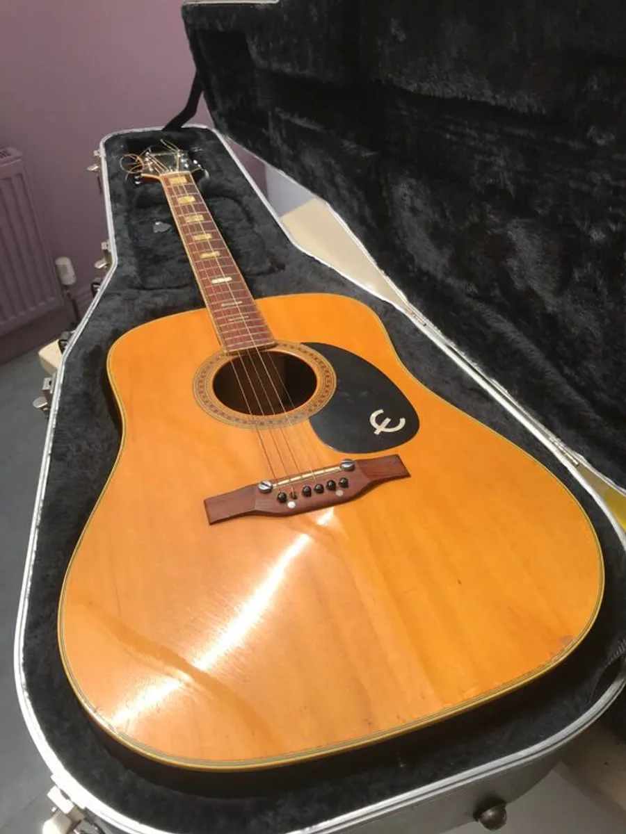 Acoustic Guitar - Image 1