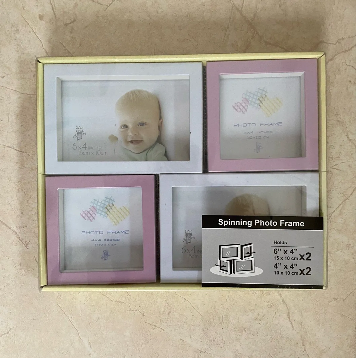 NEW SEALED Spinning Photo Frame - 4 pictures - Image 1