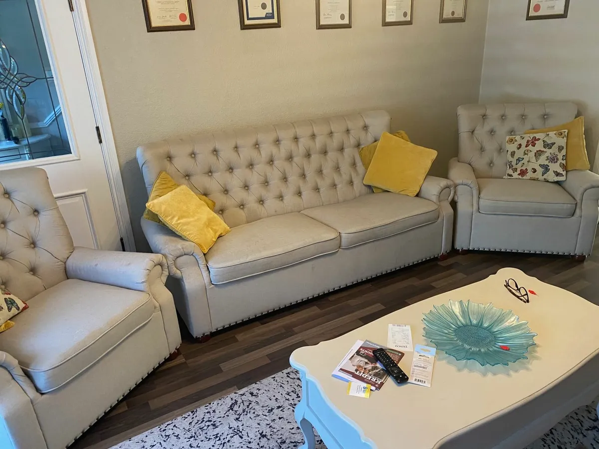 ELEGANT CREAM THREE-PIECE SUITE