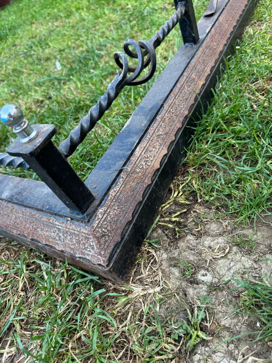**Antique Black Cast Iron Floor Fireplace Fender** - Image 1