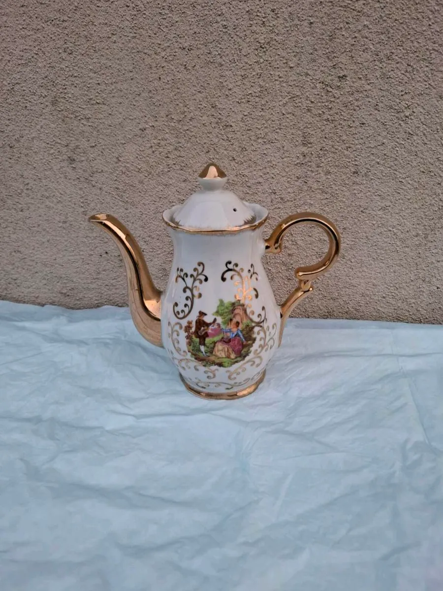 Small marquise china tea pot postage possible