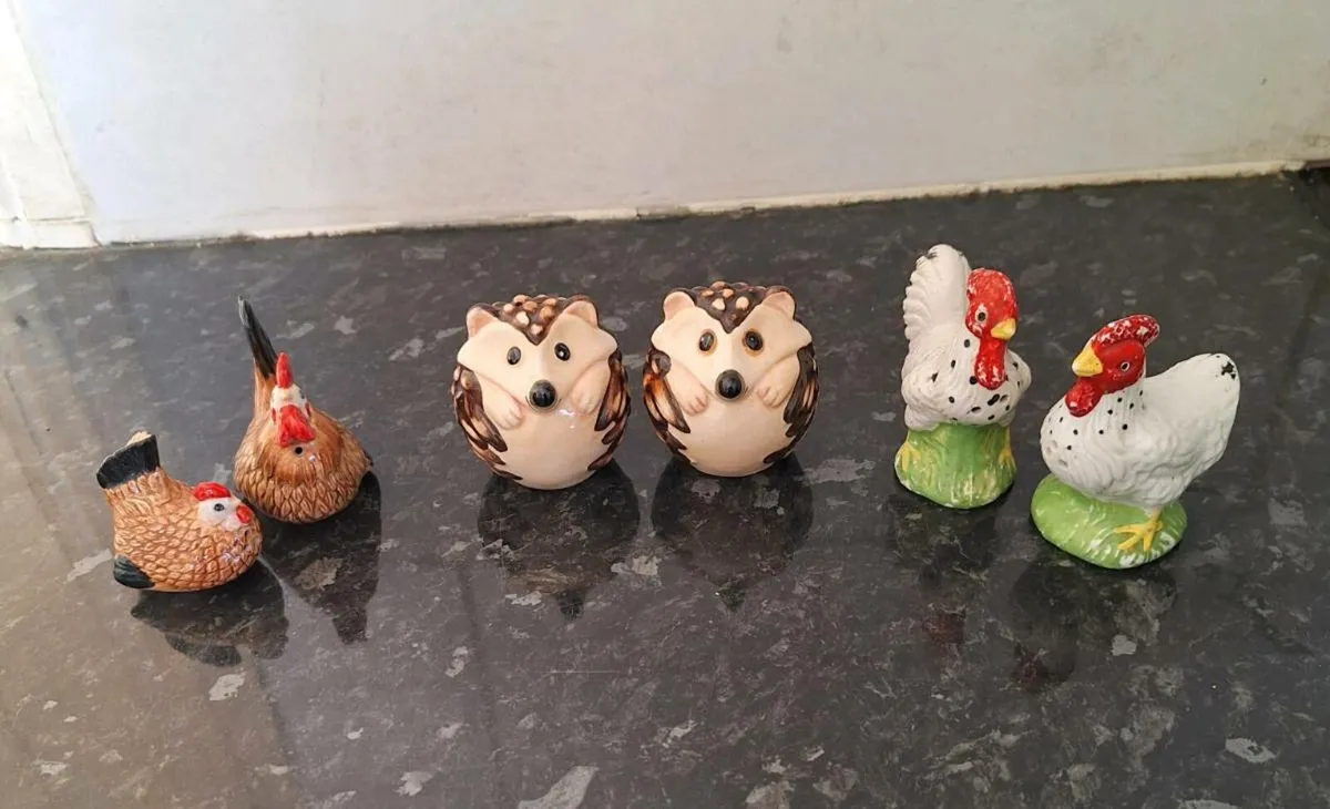 Three vintage salt and pepper shakers