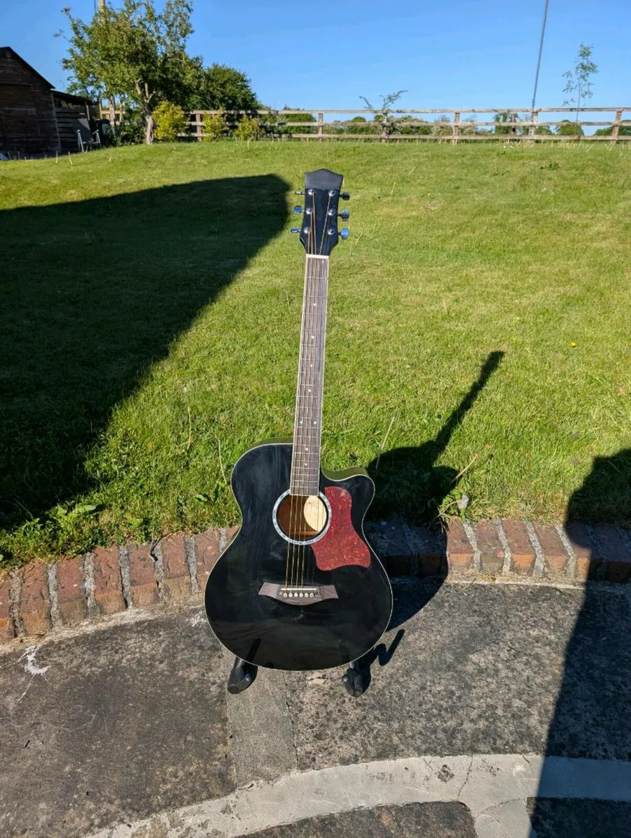 Acoustic Guitar - Image 1