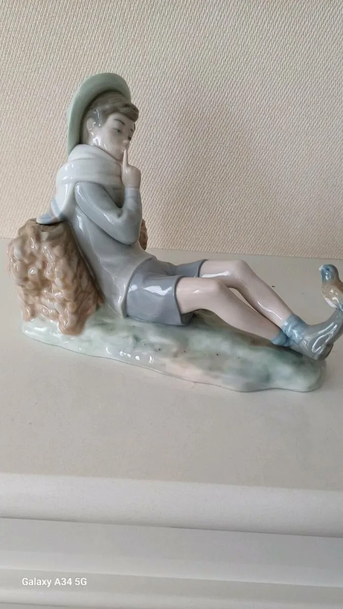 Vintage Lladro Boy on Log - Image 1