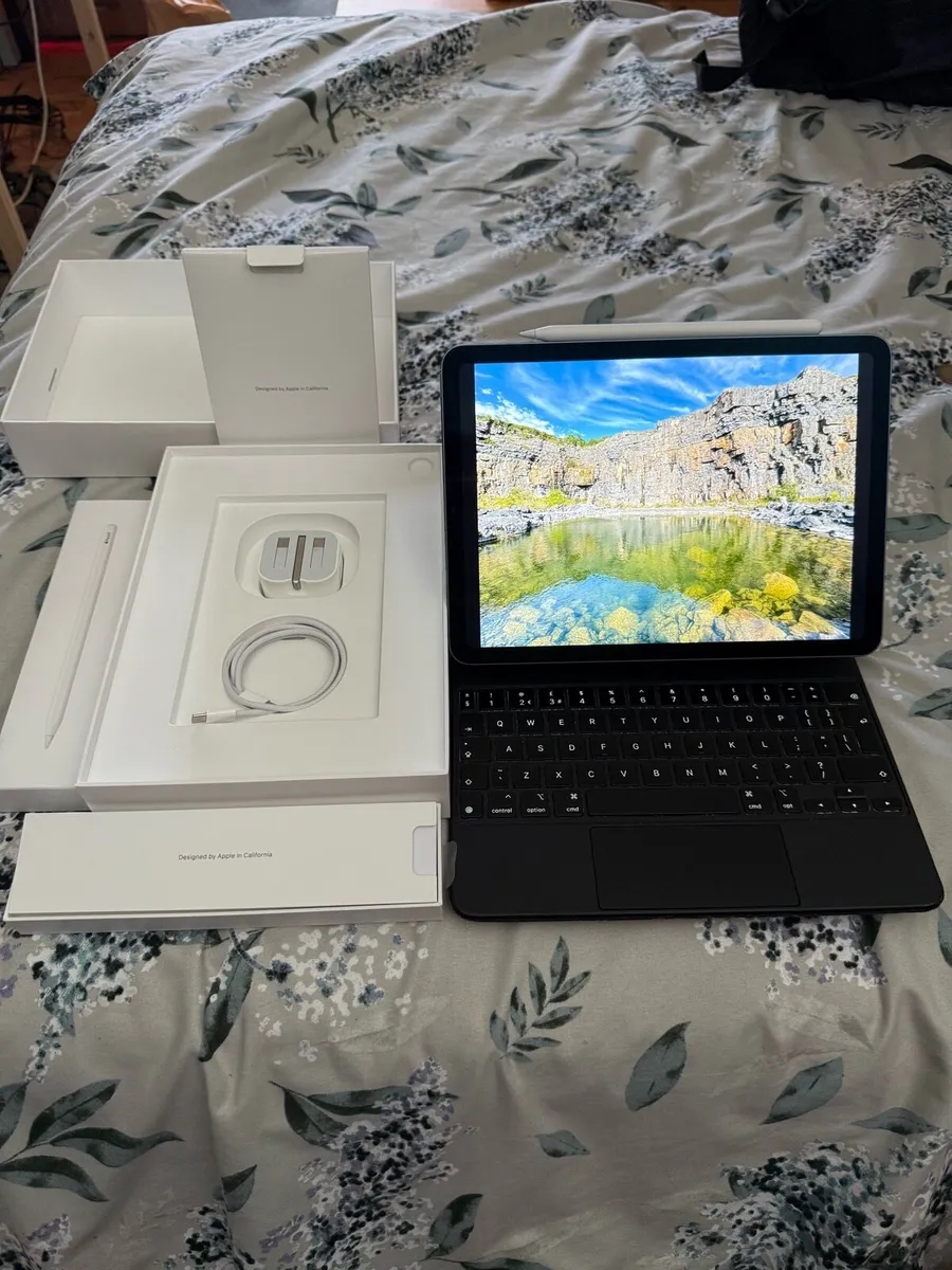iPad Air 5th Generation 256GB blue w/ Accessories - Image 1