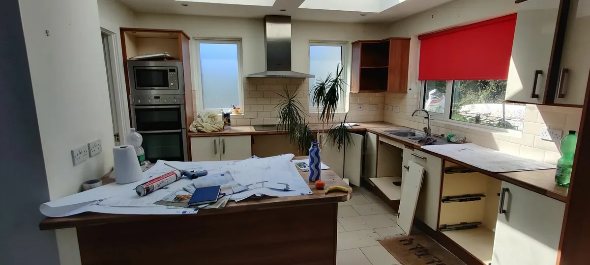 Kitchen cabinets with hob, fan, fridge freezer - Image 4