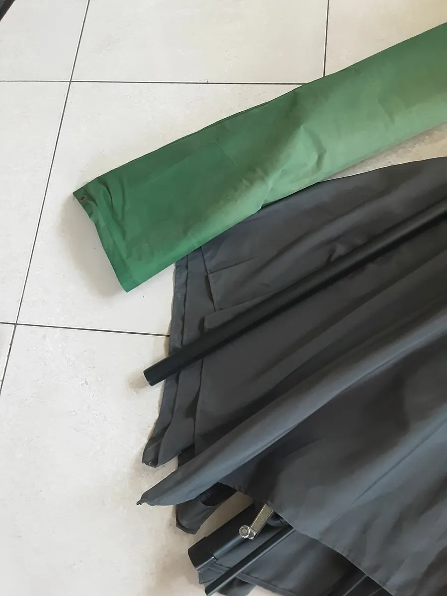 Large dark grey patio umbrella with protective cov - Image 2