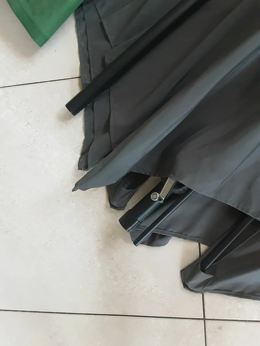 Large dark grey patio umbrella with protective cov - Image 3