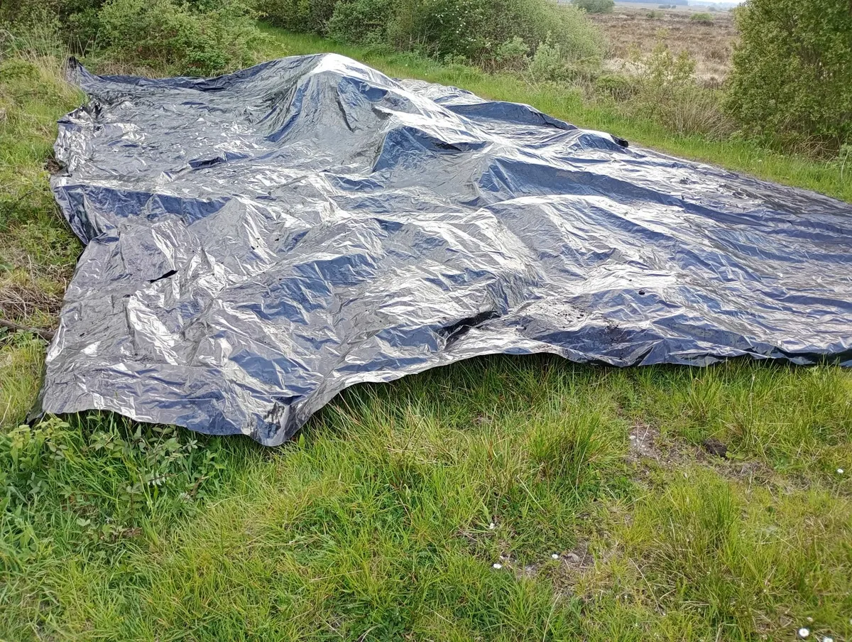 Used bags and polythene cover for firewood, turf