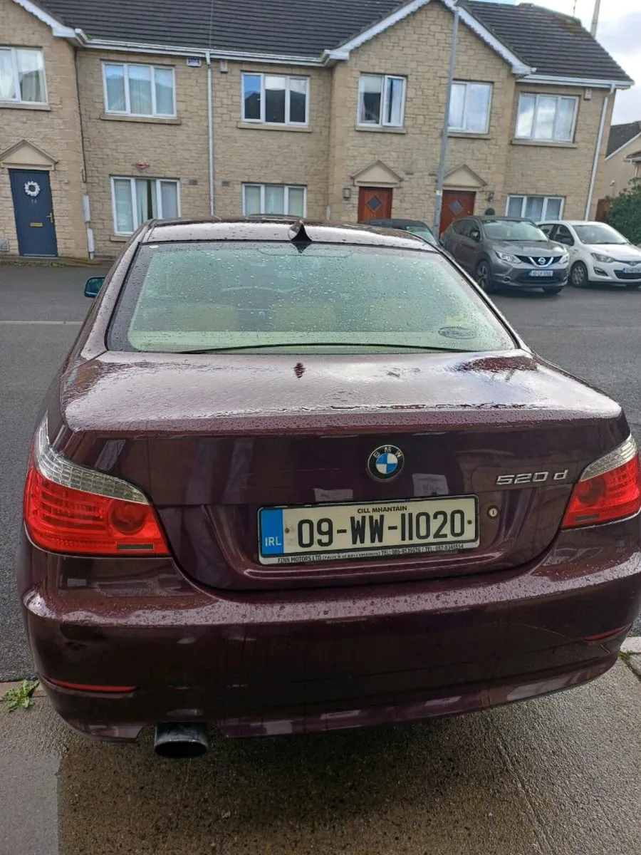 BMW 2009 burgundy - Image 1