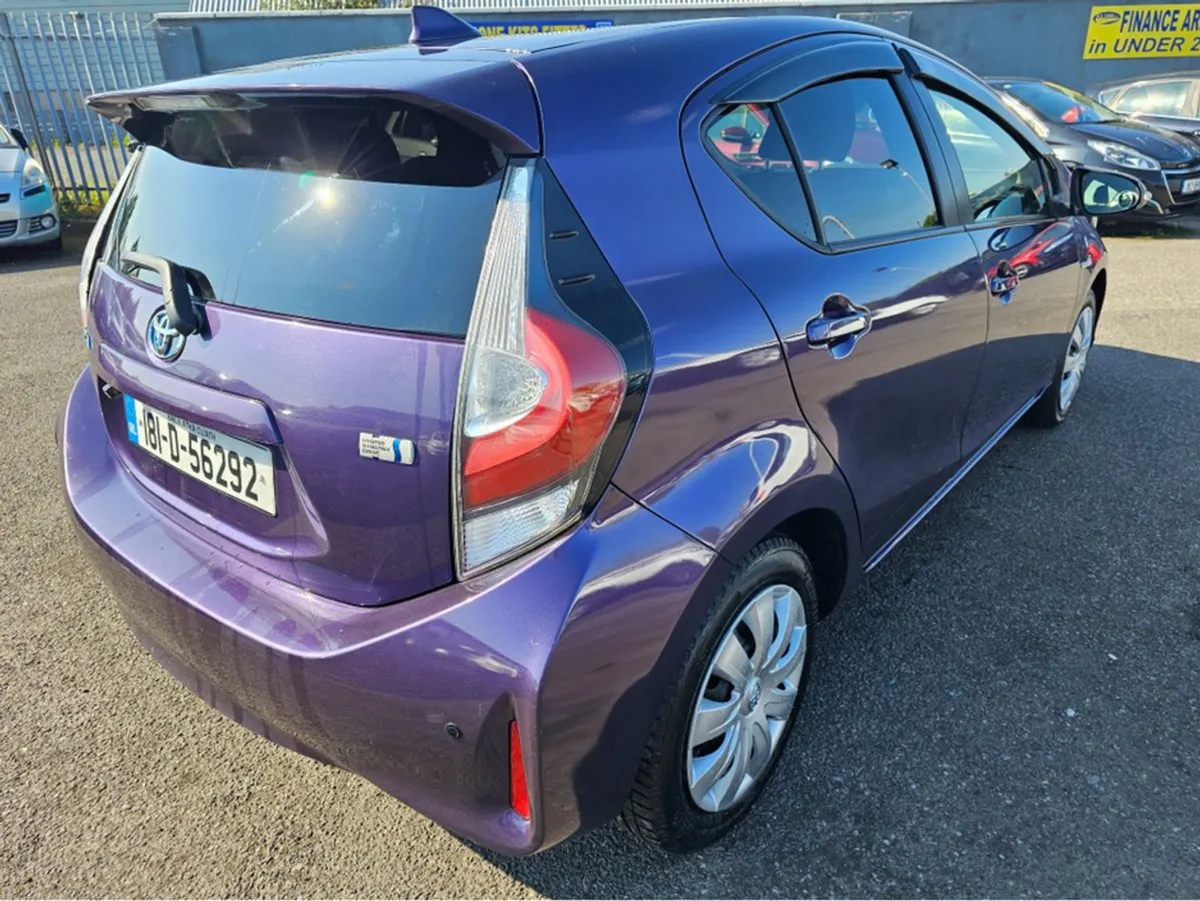 Toyota Aqua 1.5 Hybrid Automatic Shadow Purple 12 - Image 4