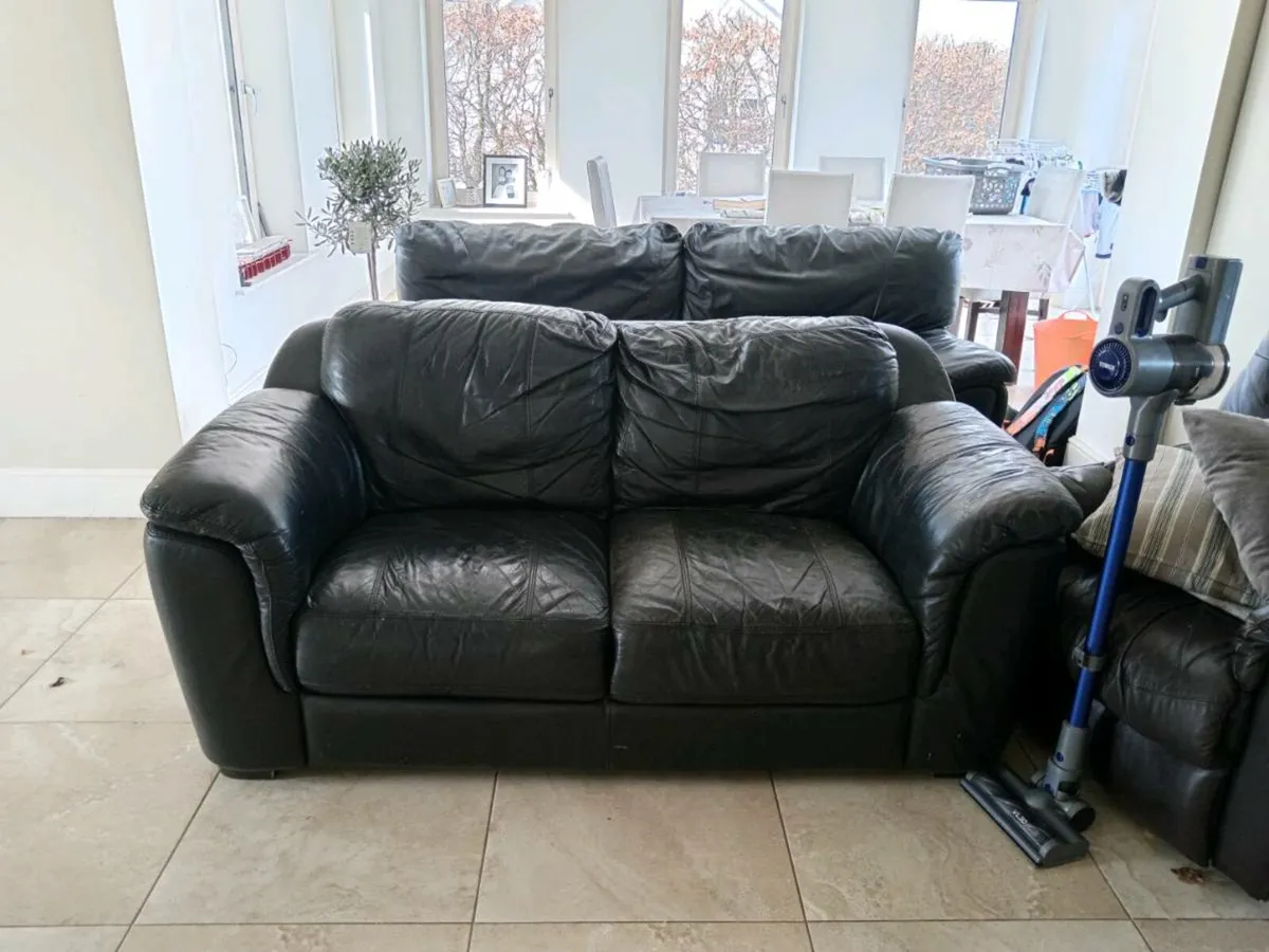 Black leather couches - Image 1