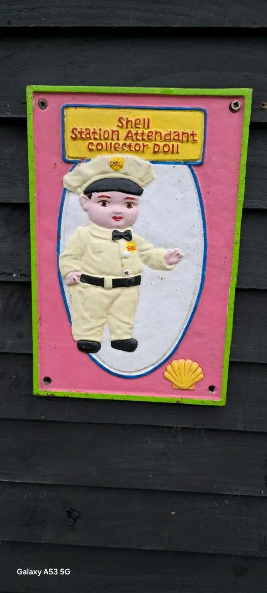 Shell cast iron  man  sign