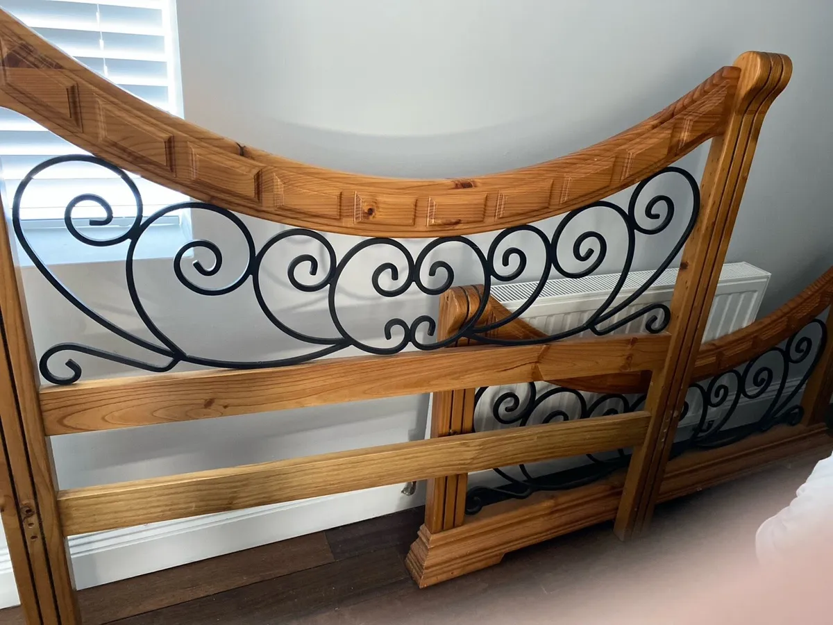 Double wood frame bed and almost new mattress