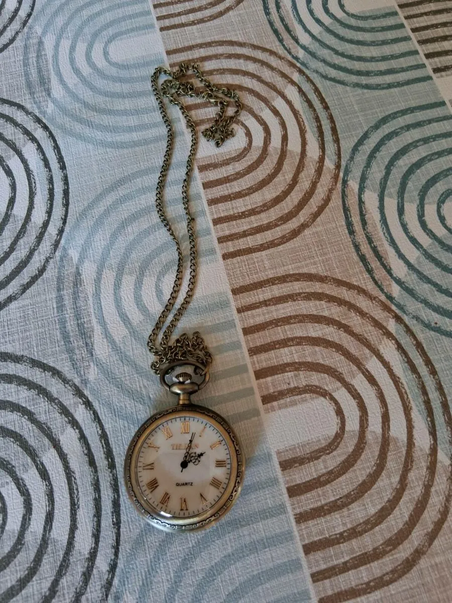 Man's pocket watch with chain