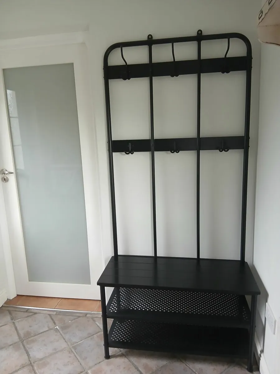 Metal coat rack with bench and shoe/boot racks. - Image 1
