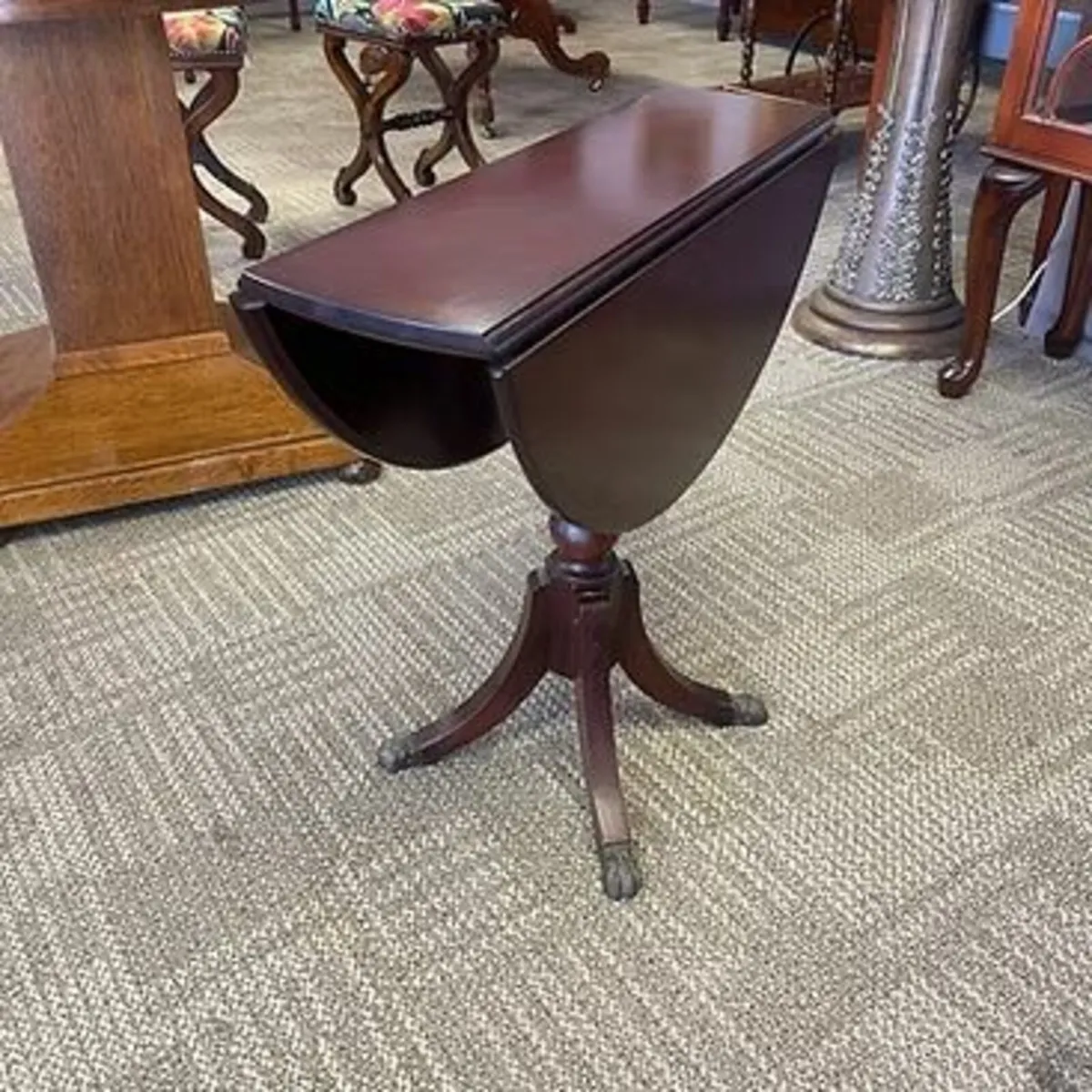 Mahogany drop leaf round occasional table