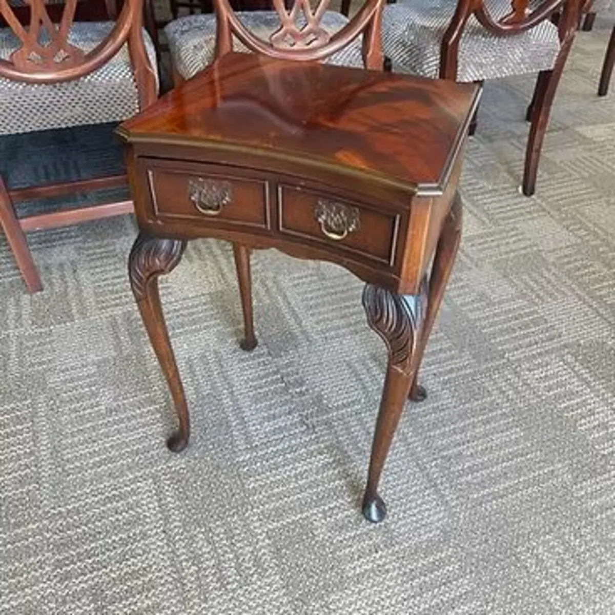 Mahogany flamed concave occasional side table