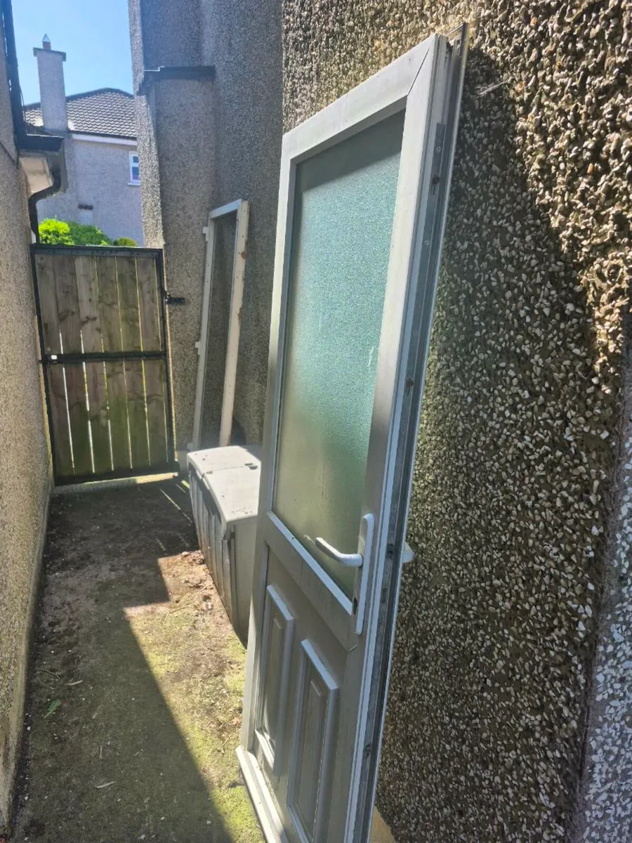 Large window and door with door frame. - Image 2