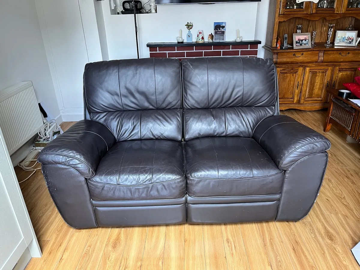 Italian leather sofa and armchair damaged by aa se - Image 1