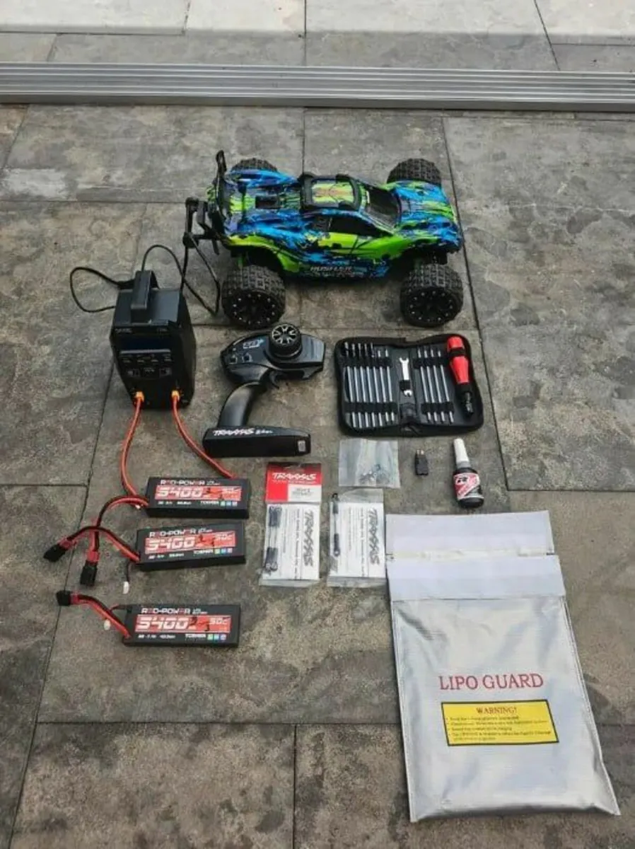 Traxxas Rustler 4x4 VXL RC big SET Dual Charger - Image 1