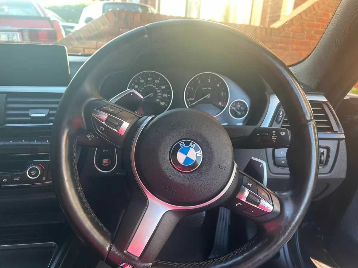 Stunning Black BMW Coupe - Image 3