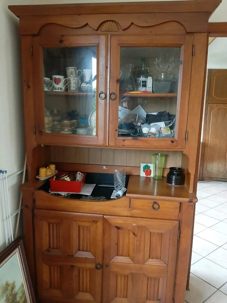 Display dresser and old wicker chair
